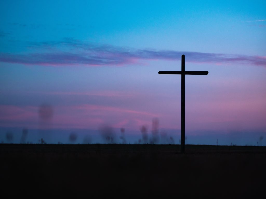 picture of cross with sunset.